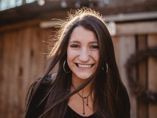 Smiling woman with glowing skin